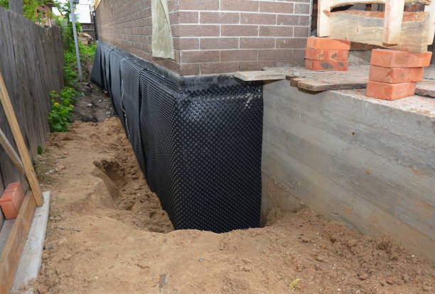 Happy homeowners after waterproofing job in Skippack